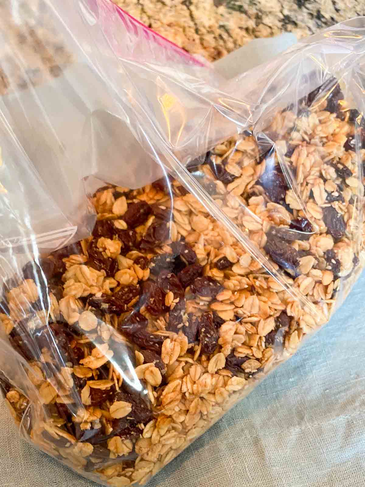 Homemade honey granola packed in a Ziploc bag, just like my mom used to store big batches for snacks and breakfasts.