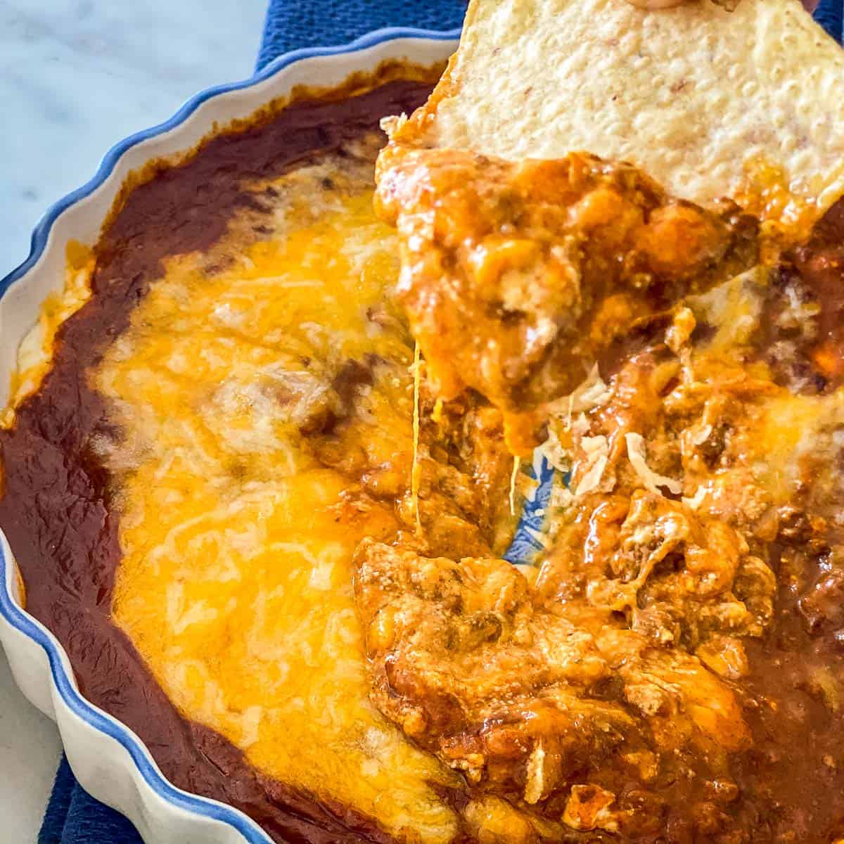 Image showing chili cheese dip with chip.