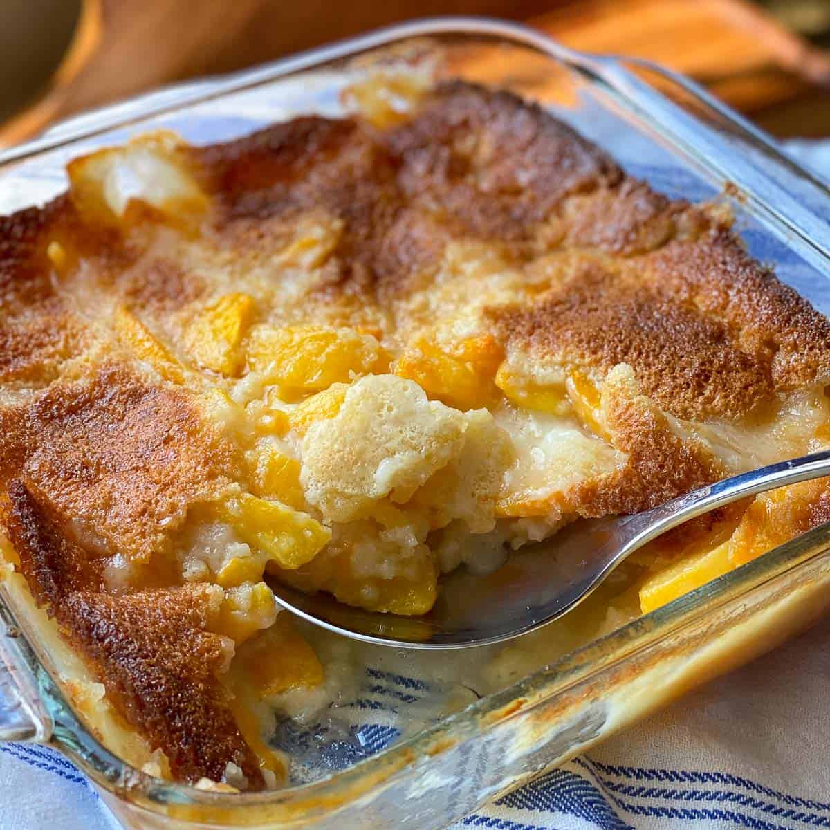 Best Peach Cobbler with portion removed.
