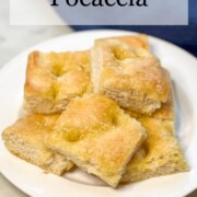 Image showing a plate full of sliced focaccia bread.