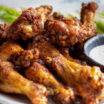 Oven baked chicken wings with ranch dip.