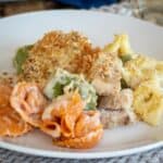 Olive Garden Asiago Tortelloni Alfredo with Grilled Chicken plated.