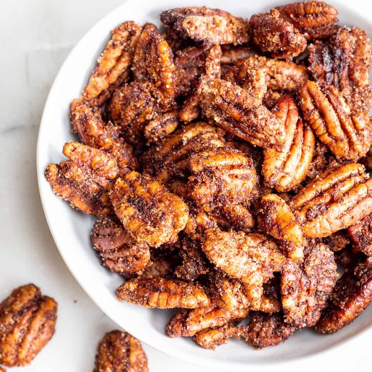 Air Fryer Candied Pecans in a white bowl.