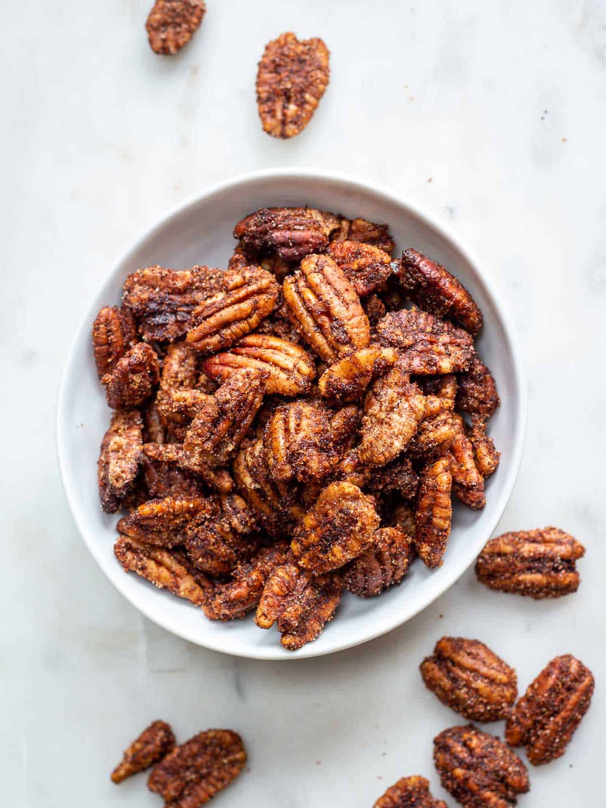Air Fryer Candied Pecans in a white bowl.