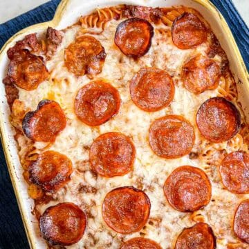 A casserole dish of baked easy pizza casserole.