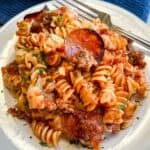 Dish of Easy Pizza Casserole with fork on top right.