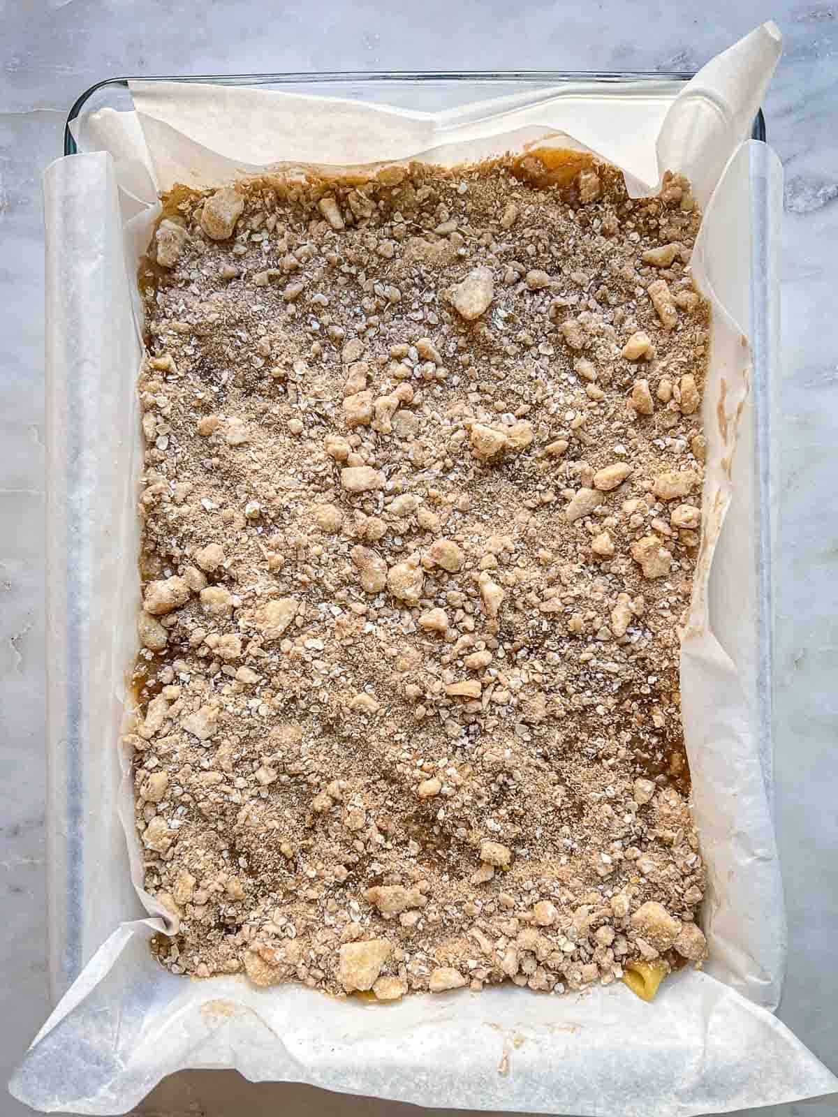 Unbaked apple pie bars recipe ready for the oven.