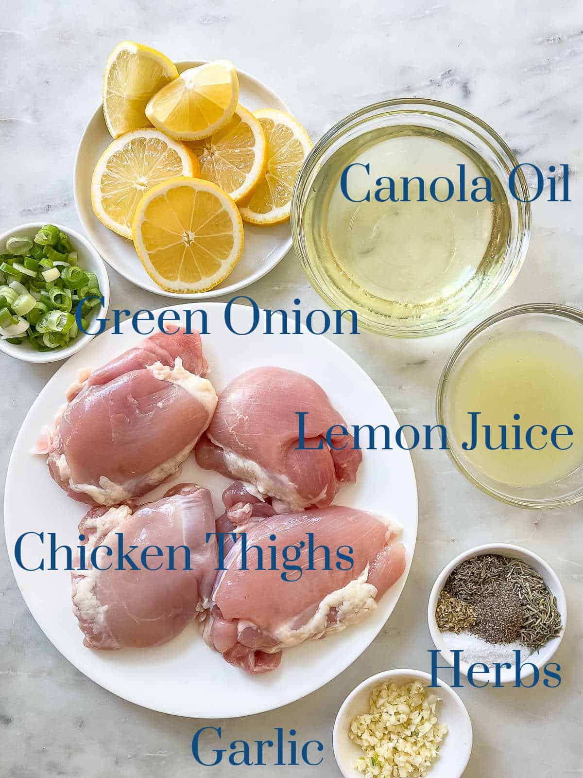 Photo of Individual ingredients for baked chicken thighs recipe.