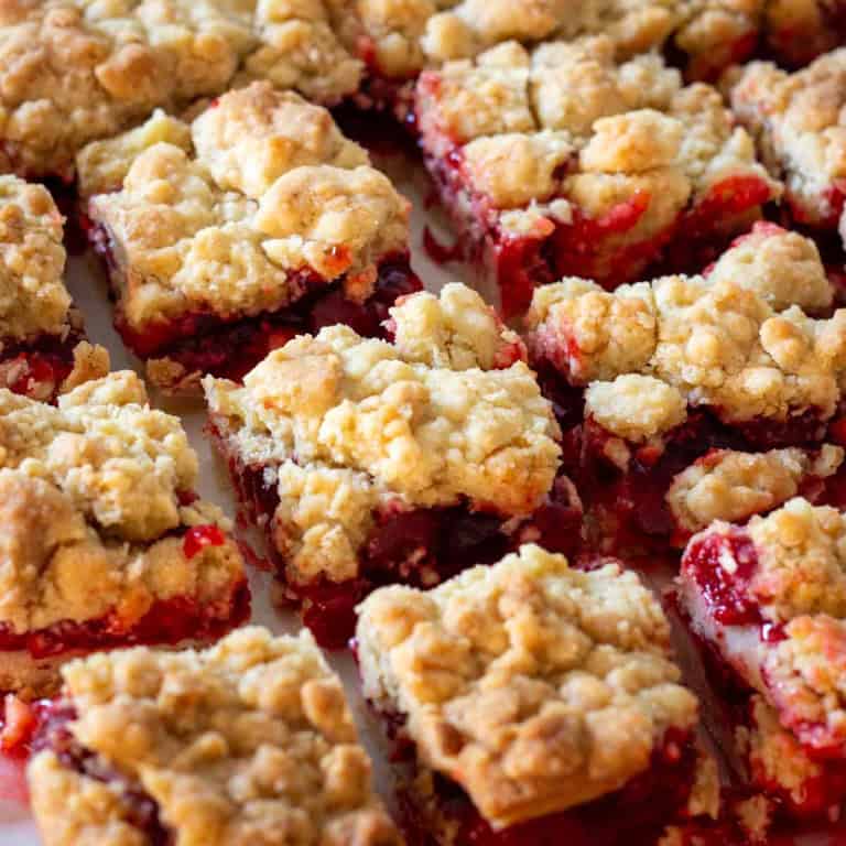 Sliced Cherry Pie Bars arranged in rows.