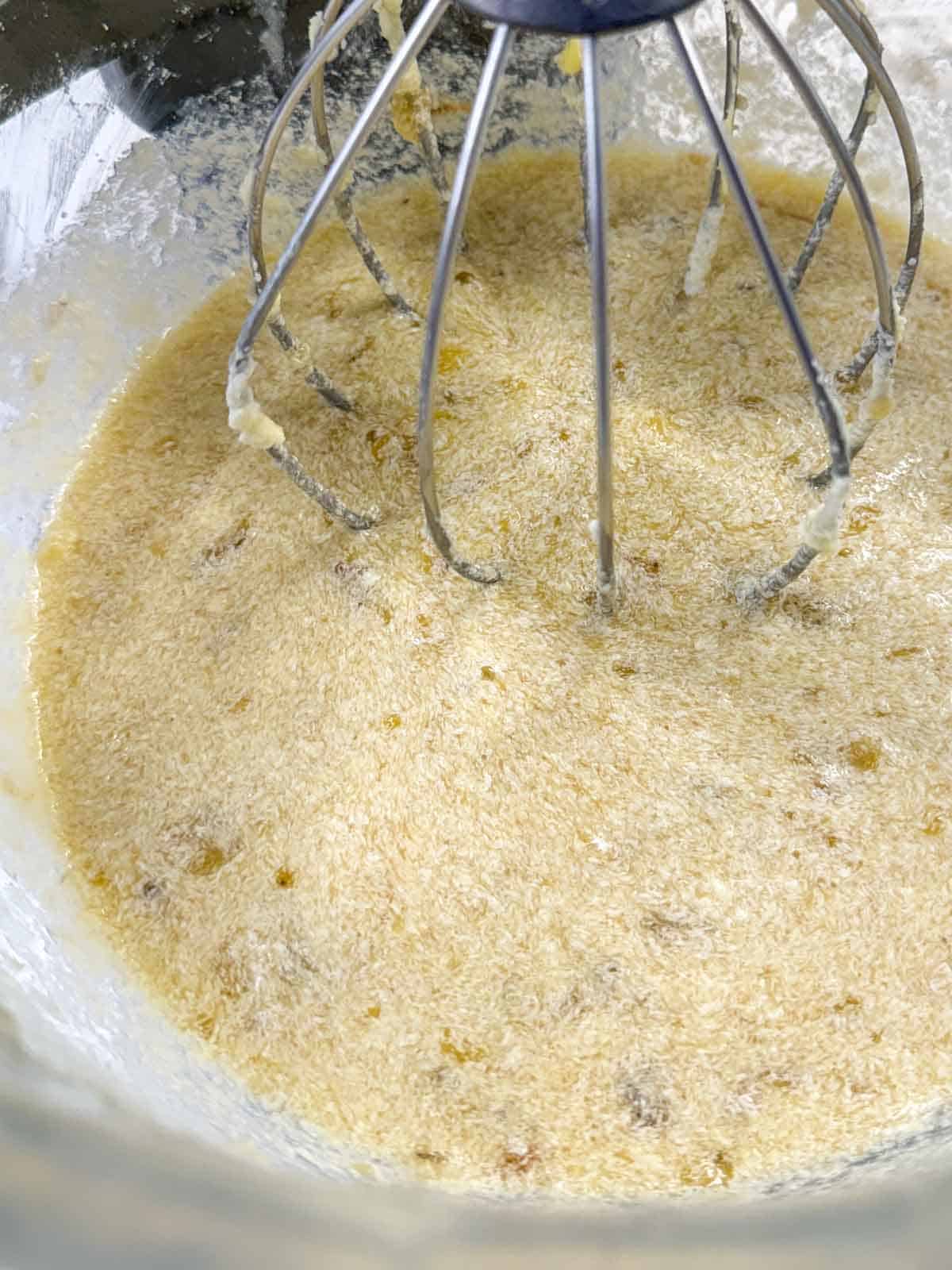 Partially prepared banana muffin batter without dry ingredients added.