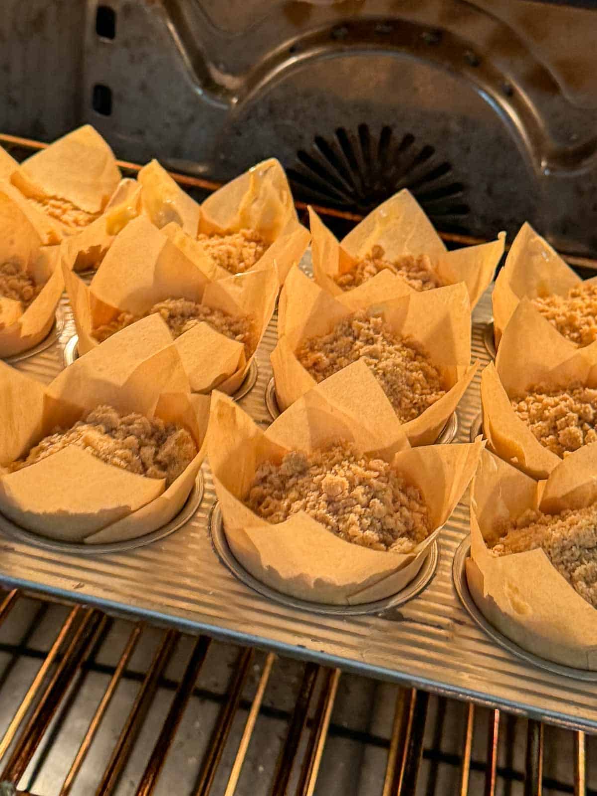 Freshly baked banana muffins in a muffin tin.