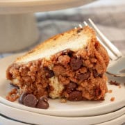 Slice of chocolate chip bundt cake showing the chocolate chip streusel topping.
