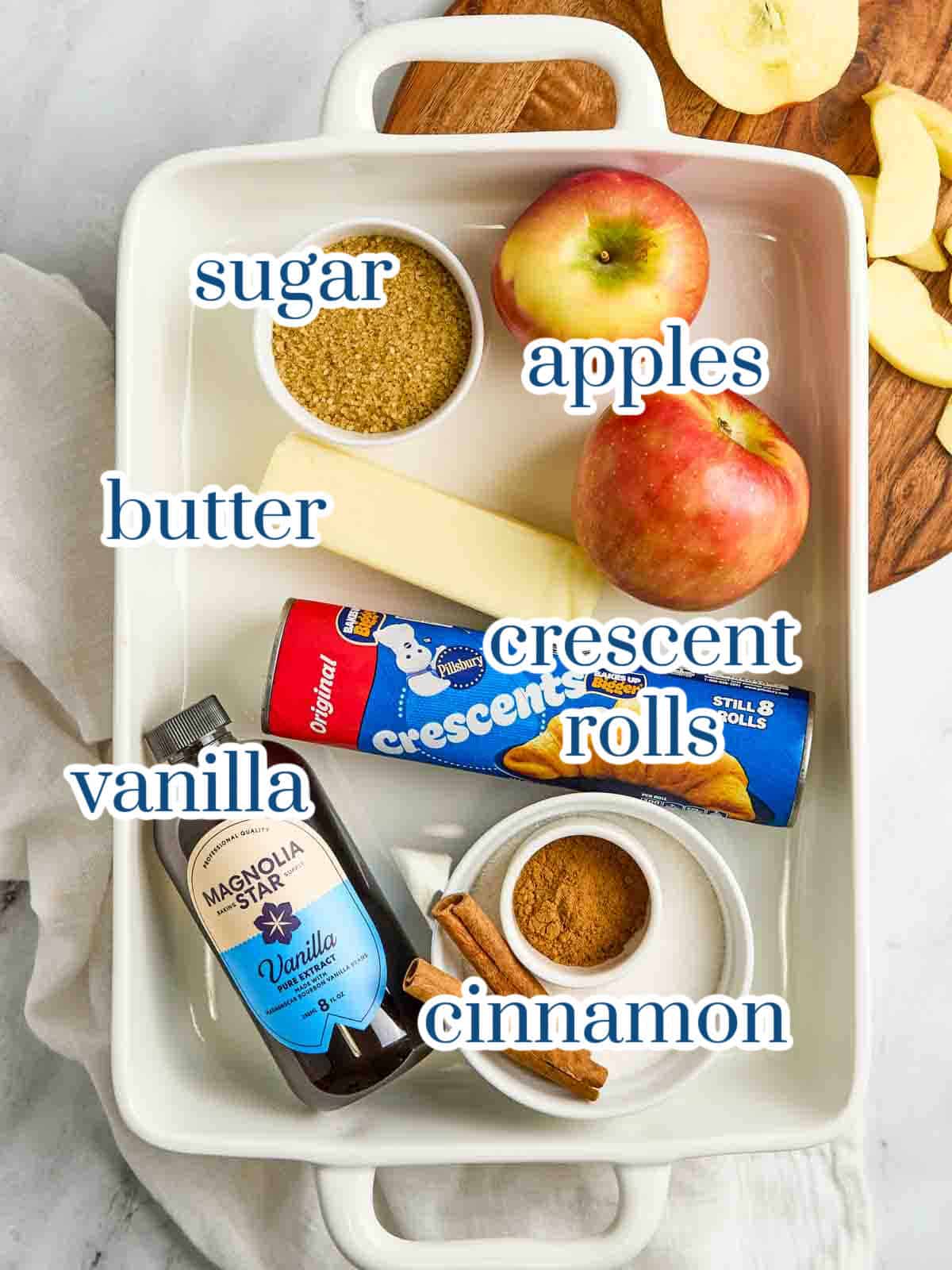 Individual ingredients for crescent roll apple dumplings.