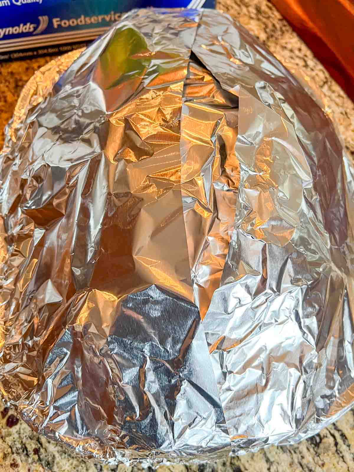 Turkey tented loosely with foil before roasting.