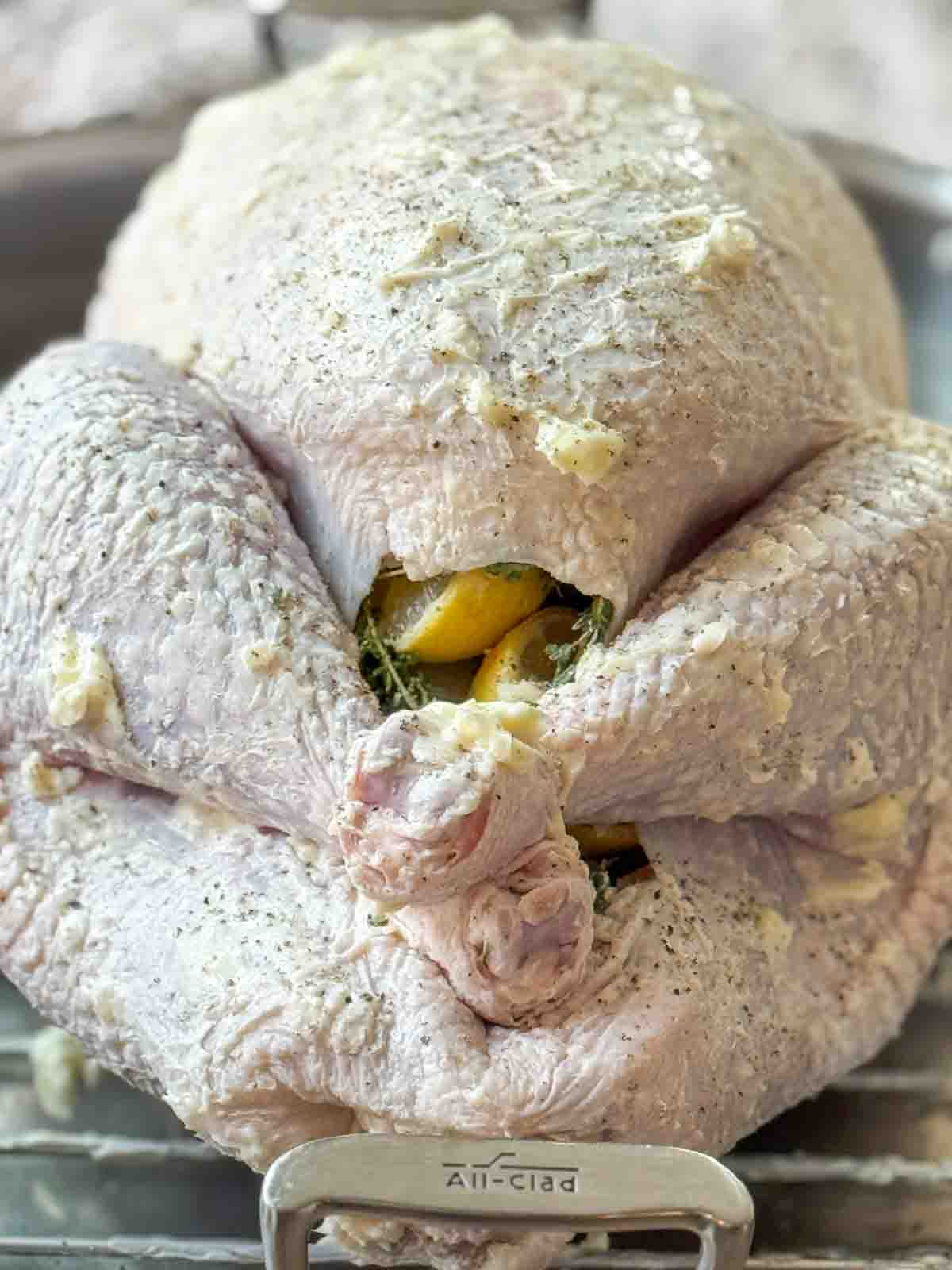 Softened butter rubbed over the skin of a whole turkey.