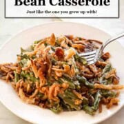 Title banner above an image of a serving of Classic green bean casserole topped with French’s crispy fried onions.