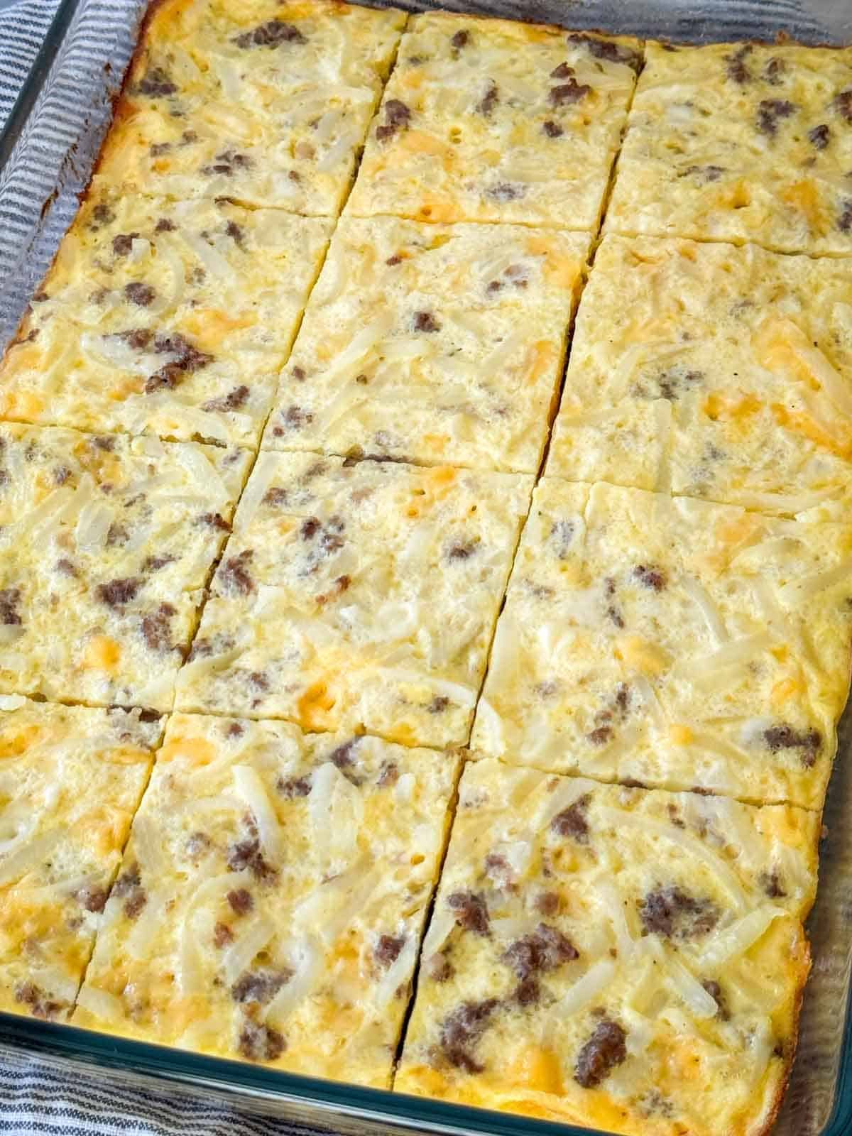 Hash brown breakfast casserole cut into 12 slices.